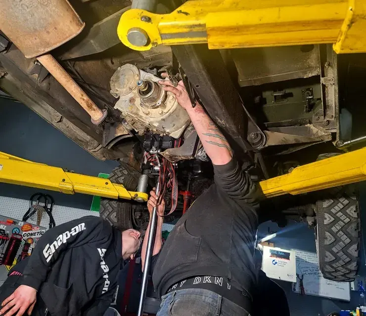 Driveline components under a vehicle